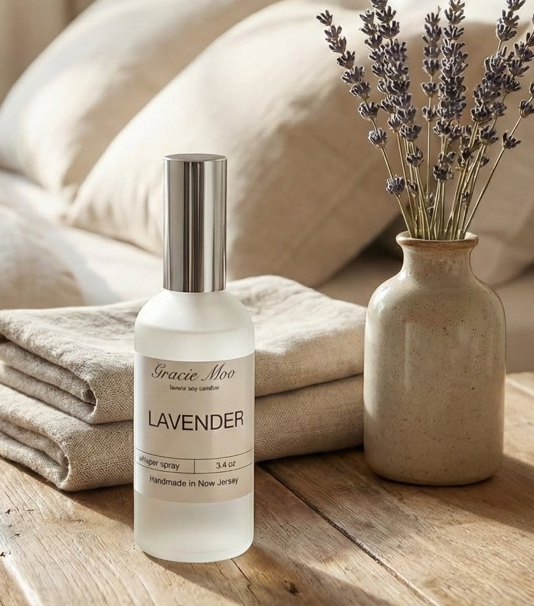 GracieMoo Candles Whisper Spray in a sleek bottle, designed for refreshing rooms with a calming scent.