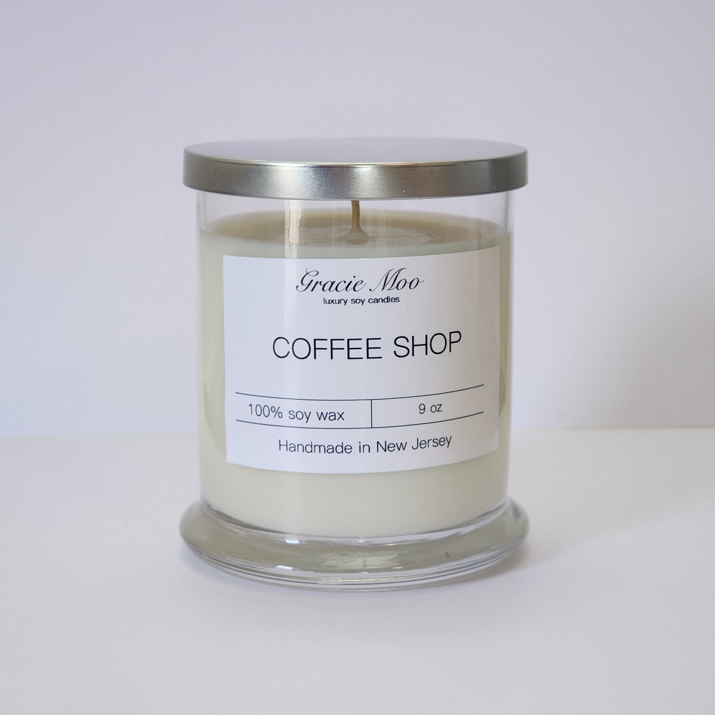 Gracie Moo Candles Coffee Shop Status Candle with warm, inviting design and soft glow, perfect for cozy spaces.