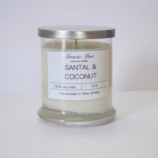 Santal & Coconut candle by Gracie Moo Candles, featuring a warm glow and a minimalist design in a glass jar.