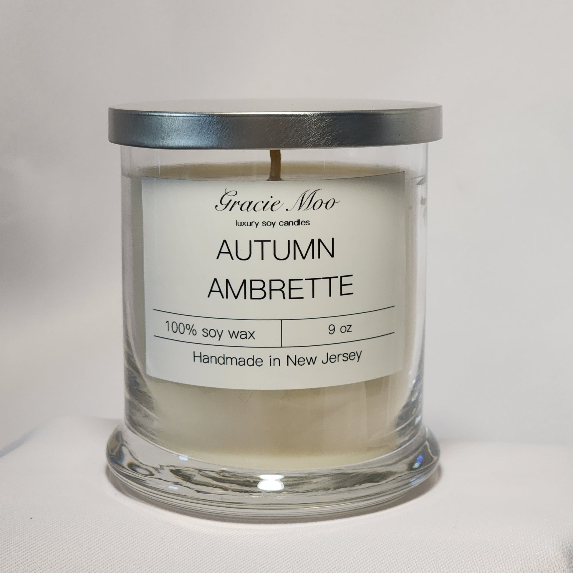 Autumn Ambrette Status Candle