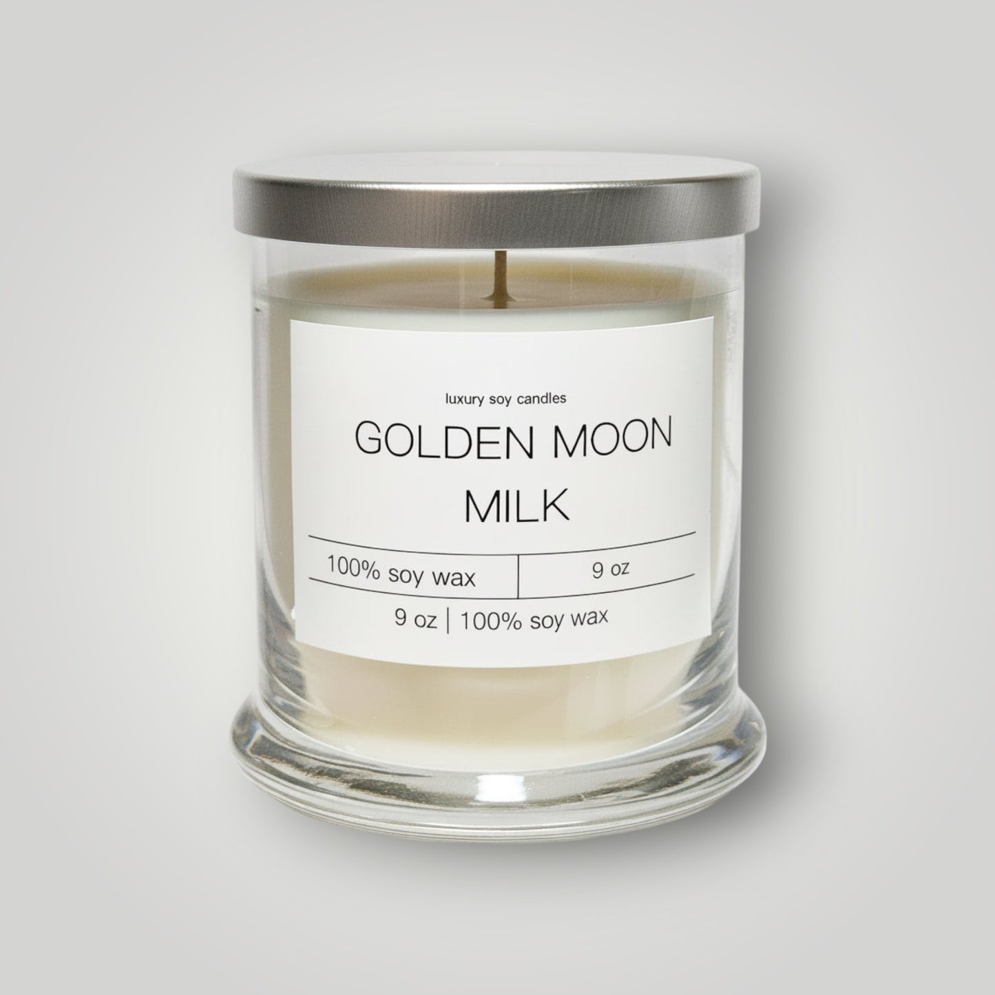Golden Moon Milk Status Candle by Gracie Moo Candles featuring a golden-hued wax and elegant design.